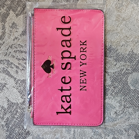 kate spade Handbags - Gifted NIP Kate Spade Dark Pink Wristlet